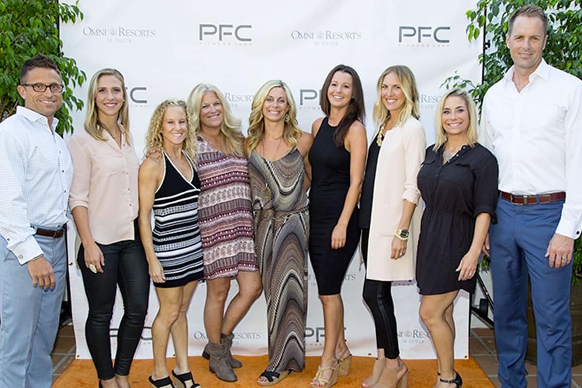 PFC executives stand together at wellness event