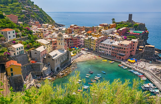VERNAZZA, ITALY - JULY 5, 2016: The village of Vernazza, Italy from the costal Cinque Terre trail along the northwestern coast of Italy.