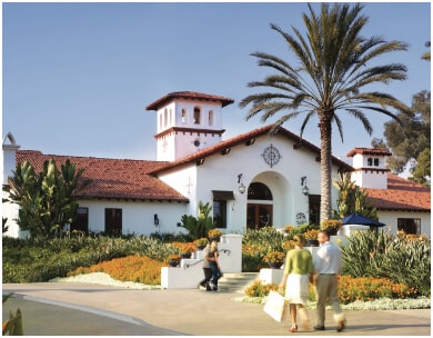 People walk outside of omni la costa resort