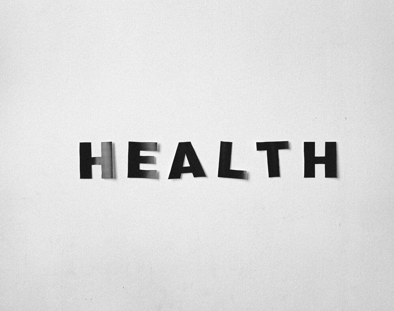 letters spelling HEALTH on white background